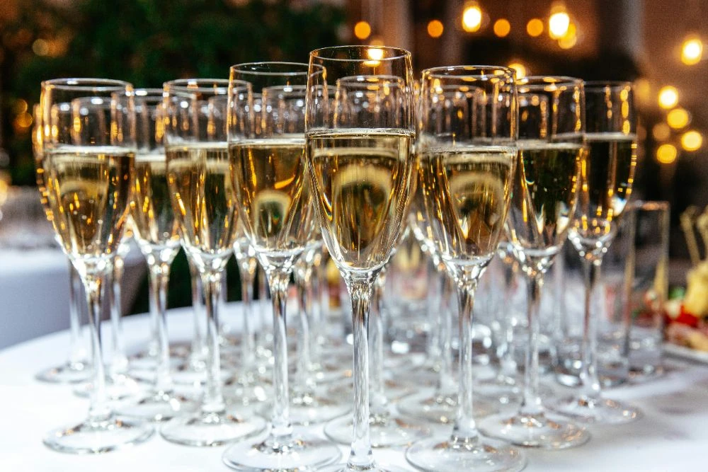 Rows of prosecco flutes elegantly arranged